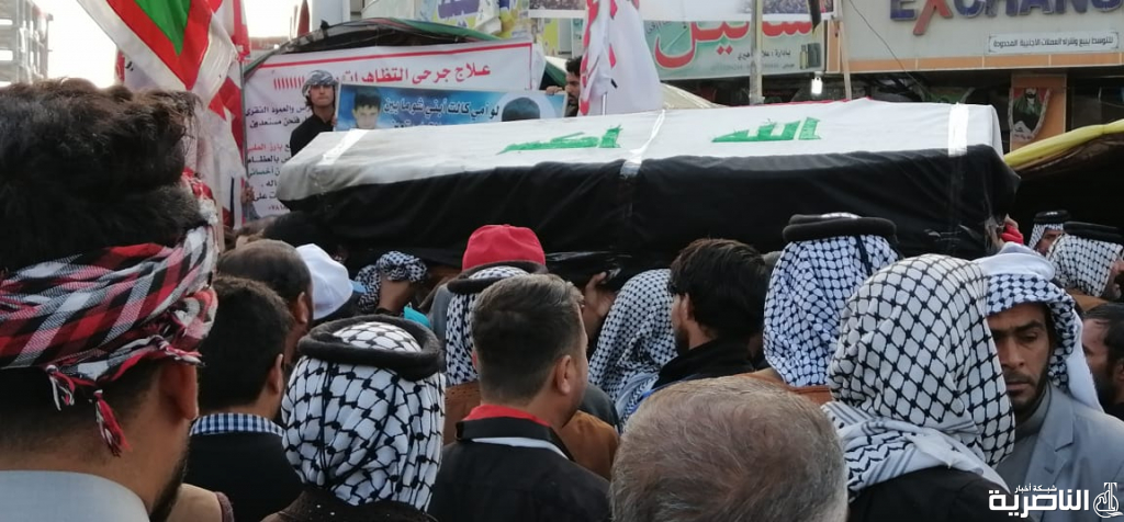 بالصور: تشييع رمزي لاصغر شهيد في تظاهرات الناصرية