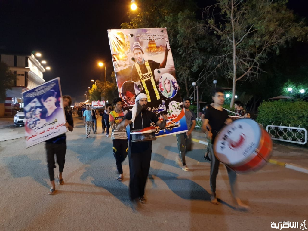 بالصور: متظاهرو الحبوبي ينظمون تسييعا رمزيا لشهداء التظاهرات