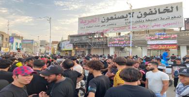 ‏بالصور: العشرات يتظاهرون وسط الناصرية مطالبين الكشف عن مصير سجاد العراقي‏