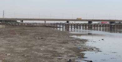 بالصور: إنخفاض مخيف  بمناسيب نهر الفرات في الناصرية 