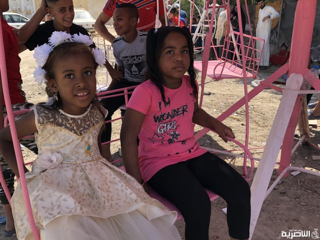 بالصور:اطفال ذوي الدخل المحدود يقضون اول ايام عيد الفطر بساحات خاوية