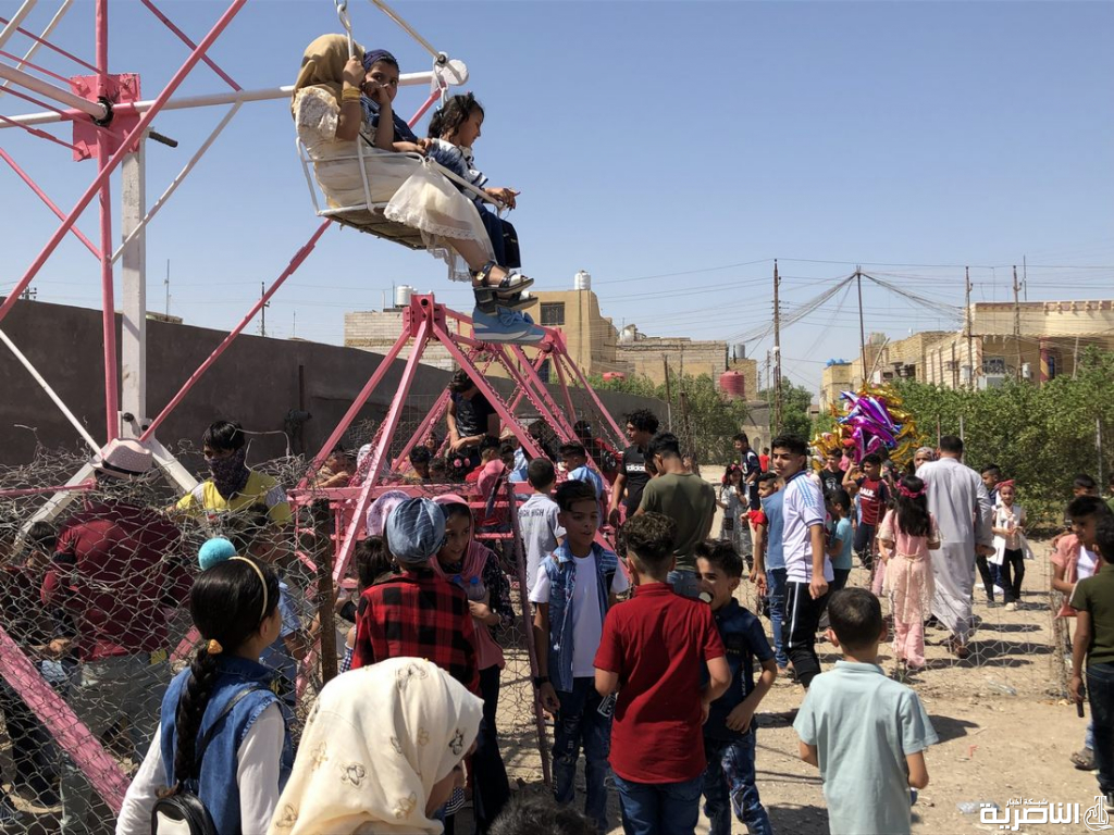 بالصور:اطفال ذوي الدخل المحدود يقضون اول ايام عيد الفطر بساحات خاوية