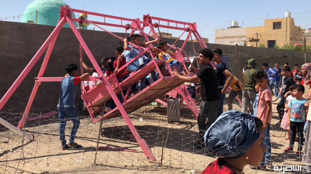 بالصور:اطفال ذوي الدخل المحدود يقضون اول ايام عيد الفطر بساحات خاوية