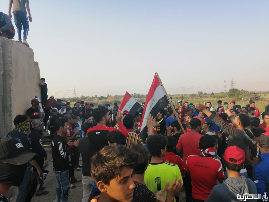 الناصرية تحترق الان!حرق بيت برلماني للمرة الثانية وآبار الغراف وقوات دربتها أمريكا تقف على جس الزيتون بالصور: متظاهرو قلعة سكر يتجمعون مجددا امام حقل الغراف النفطي