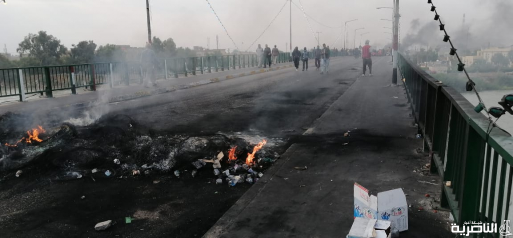 بالصور: قطع جسر النصر في مدينة الناصرية