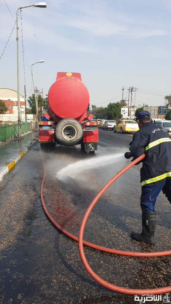 الدفاع المدني ينفذ حملة لغسل شوارع الناصرية