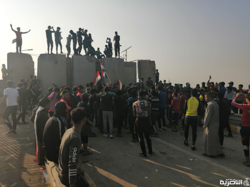 الناصرية تحترق الان!حرق بيت برلماني للمرة الثانية وآبار الغراف وقوات دربتها أمريكا تقف على جس الزيتون بالصور: متظاهرو قلعة سكر يتجمعون مجددا امام حقل الغراف النفطي