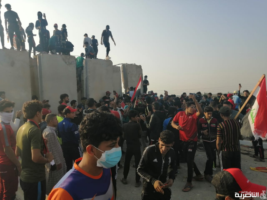 الناصرية تحترق الان!حرق بيت برلماني للمرة الثانية وآبار الغراف وقوات دربتها أمريكا تقف على جس الزيتون بالصور: متظاهرو قلعة سكر يتجمعون مجددا امام حقل الغراف النفطي