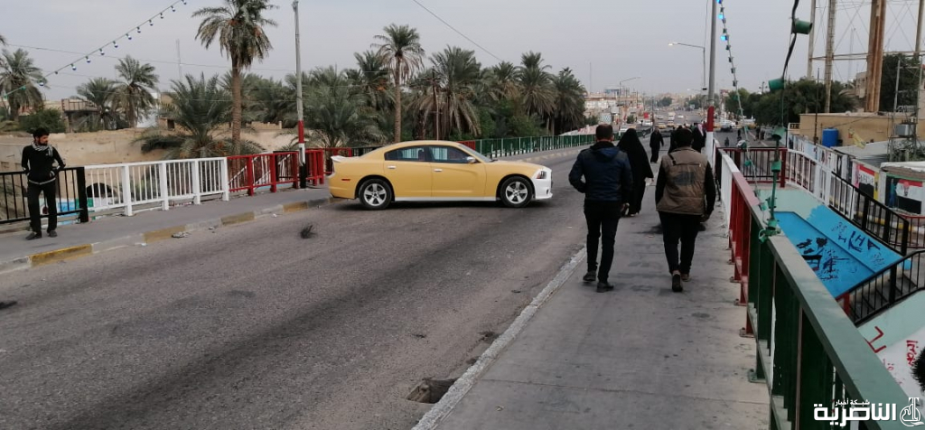 بالصور: قطع جسر النصر في مدينة الناصرية