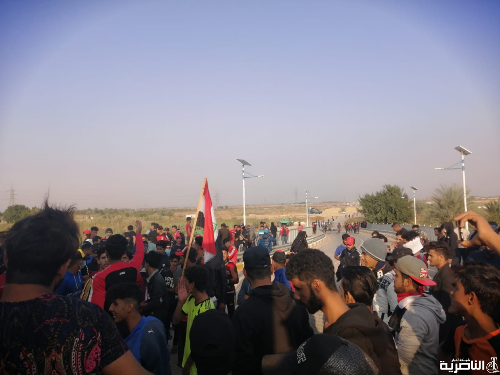 الناصرية تحترق الان!حرق بيت برلماني للمرة الثانية وآبار الغراف وقوات دربتها أمريكا تقف على جس الزيتون بالصور: متظاهرو قلعة سكر يتجمعون مجددا امام حقل الغراف النفطي