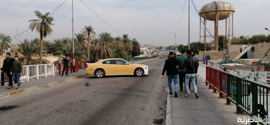 بالصور: قطع جسر النصر في مدينة الناصرية