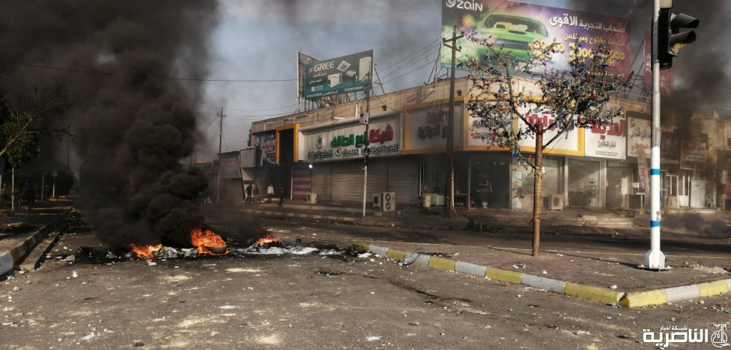بالصور: الاطارات المحترقة تغلق تقاطع البهو والتربية وسط الناصرية