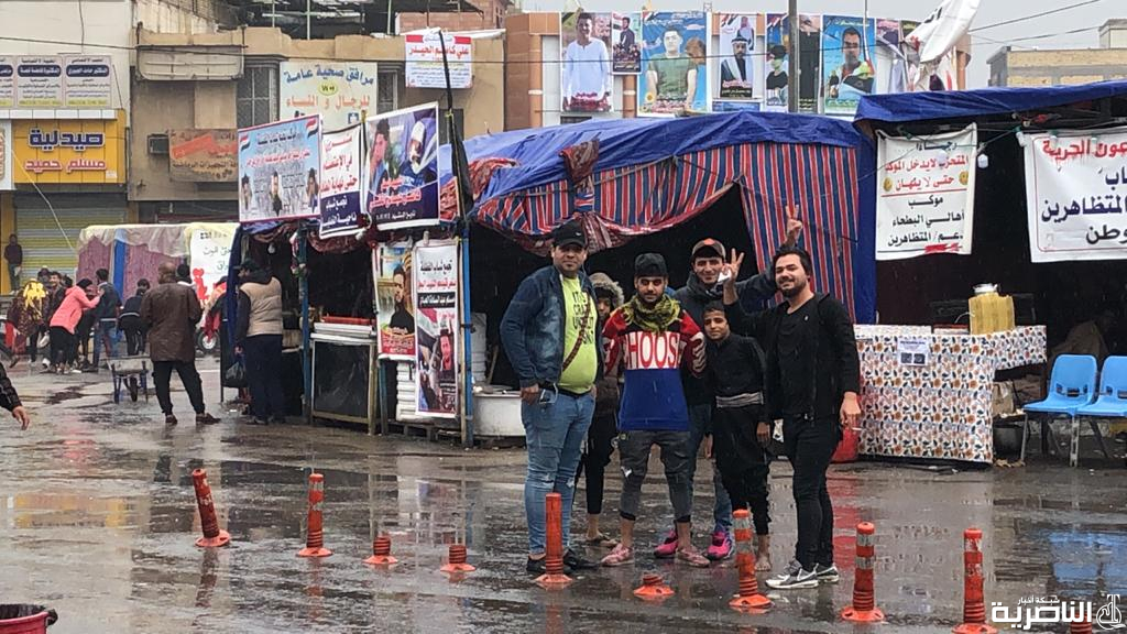 بالصور: رغم الامطار وسوء الاحوال الجوية، الناصرية تستمر بالتظاهرات