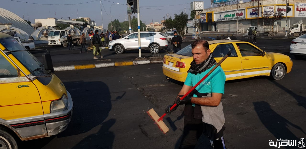 بالصور: حملة لتنظيف الشوارع والتقاطعات الرئيسة في الناصرية