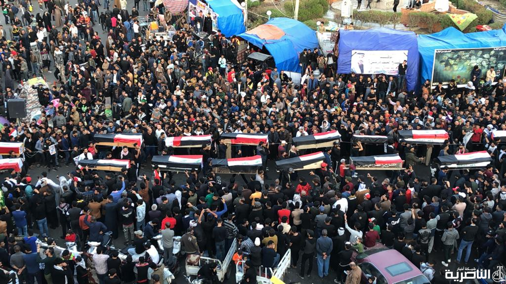 بالصور: التشيع الرمزي لاكثر من 100 شهيد سقطوا في تظاهرات الناصرية