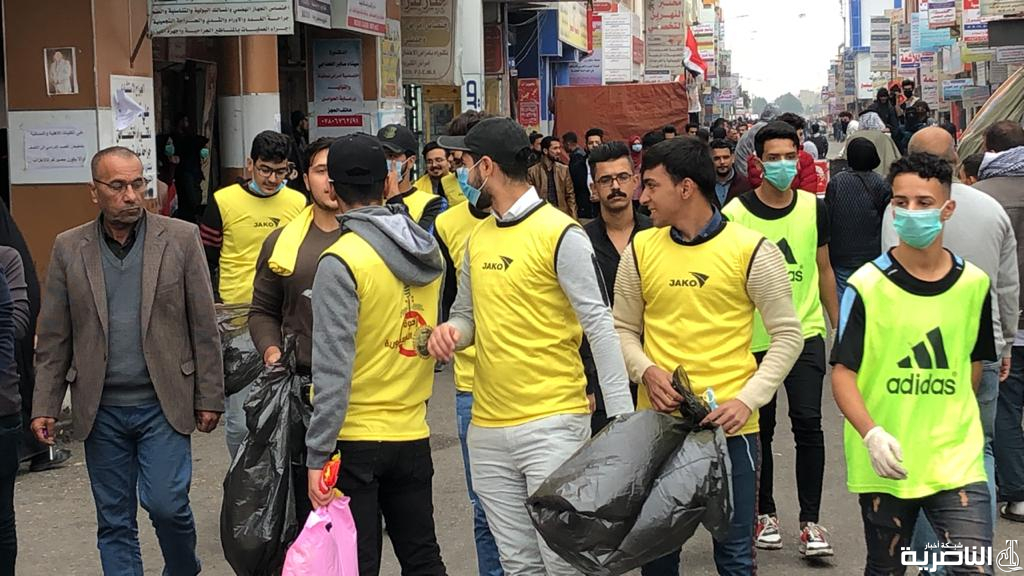 بالصور: حملات تطوعية لتنظيف محيط ساحة التظاهرات في الناصرية