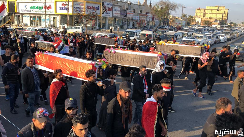 بالصور: التشيع الرمزي لاكثر من 100 شهيد سقطوا في تظاهرات الناصرية