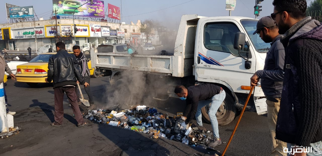 بالصور: حملة لتنظيف الشوارع والتقاطعات الرئيسة في الناصرية