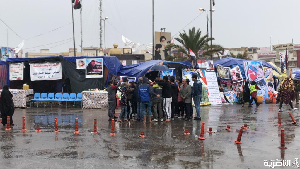 بالصور: رغم الامطار وسوء الاحوال الجوية، الناصرية تستمر بالتظاهرات
