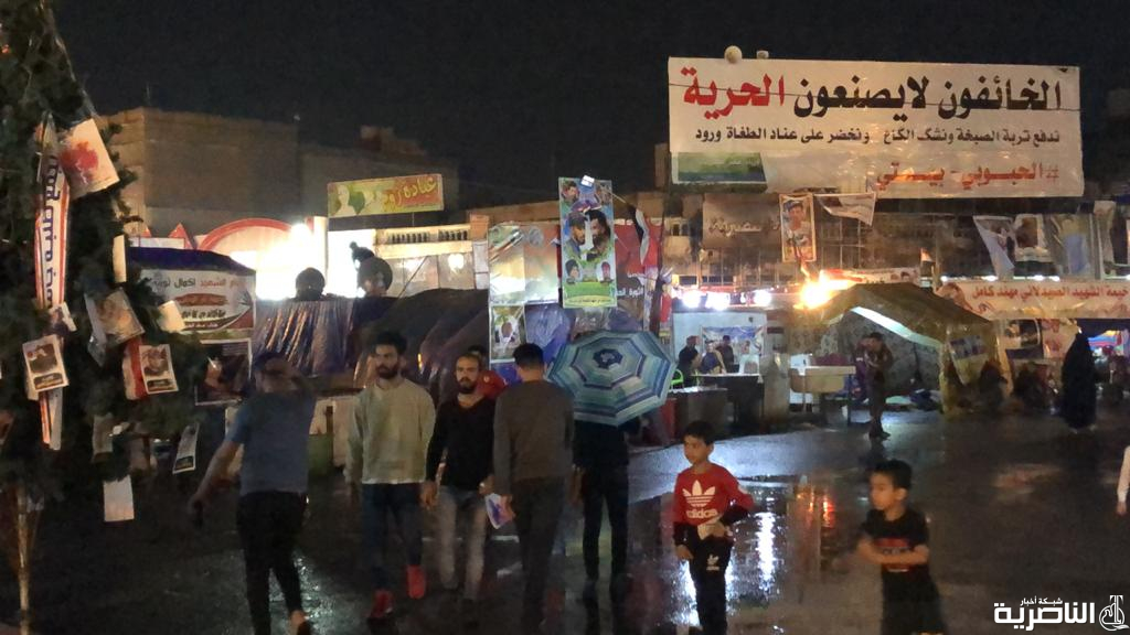 بالصور: متظاهرو الحبوبي حاضرون في الساحة رغم الامطار