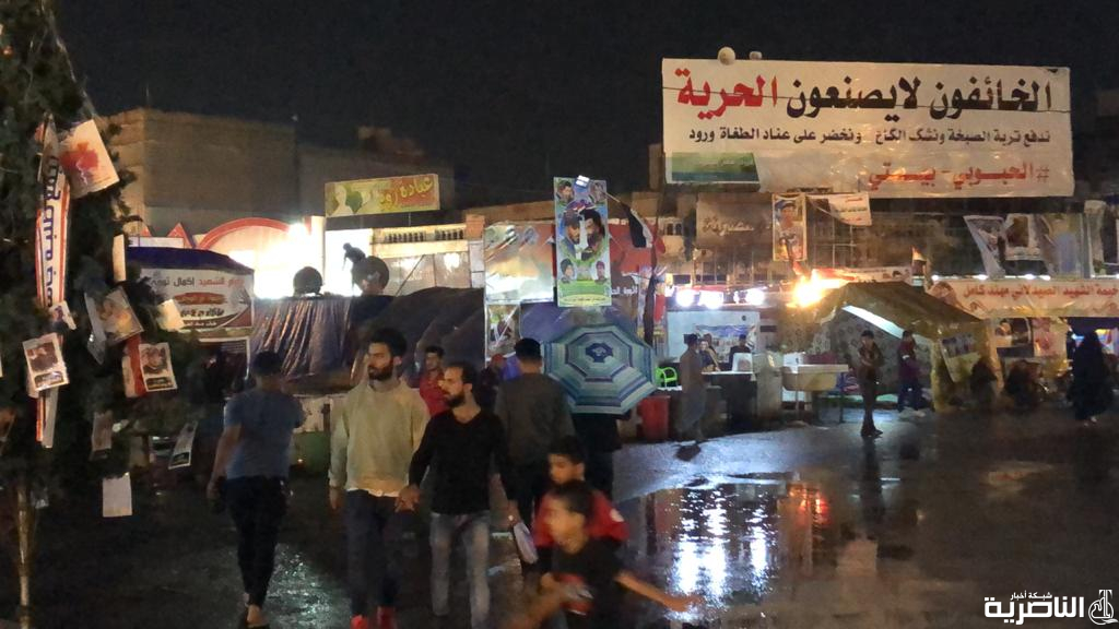 بالصور: متظاهرو الحبوبي حاضرون في الساحة رغم الامطار