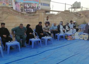 بالصور: ذوو ضحايا مركز النقاء في الناصرية يحيون الذكرى السنوية الأولى للفاجعة