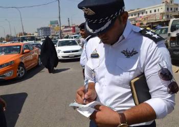 سائق يدهس شرطي مرور وسط الناصرية ويلوذ بالفرار 